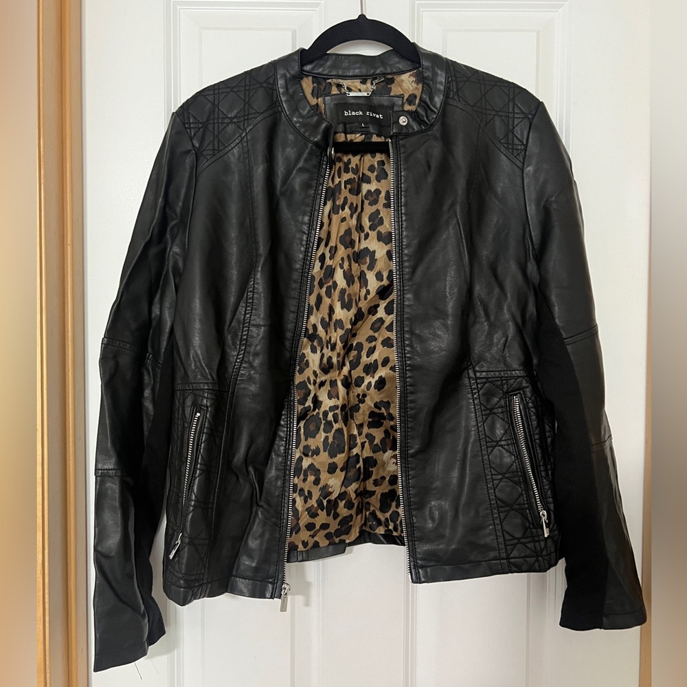 Black Rivet faux leather jacket with cheetah lining.